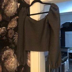 Bishop-sleeved green blouse